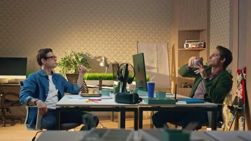 Relaxed Freelancers Tossing Ball Talking at Office Two Smart Men Communicating