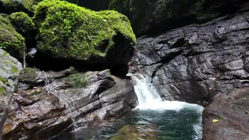 waterfalls and flowing water form pools
