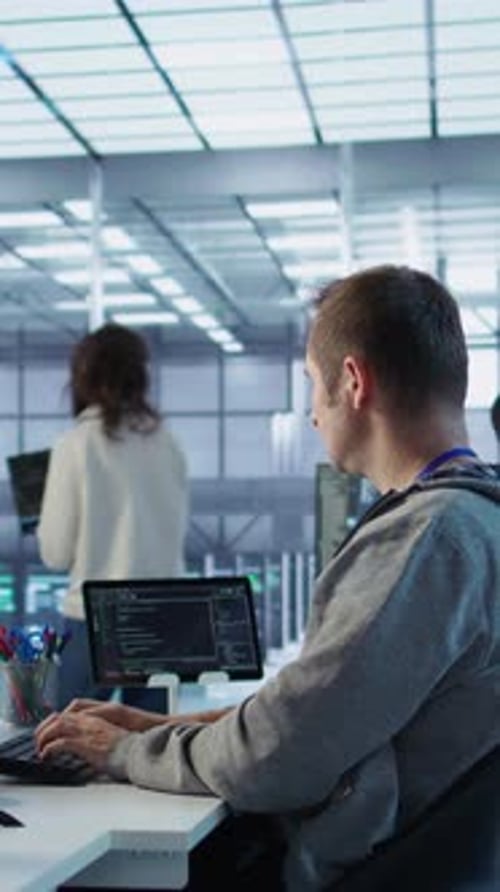 Manager Admonishing Programmer After Making Error in Data Center