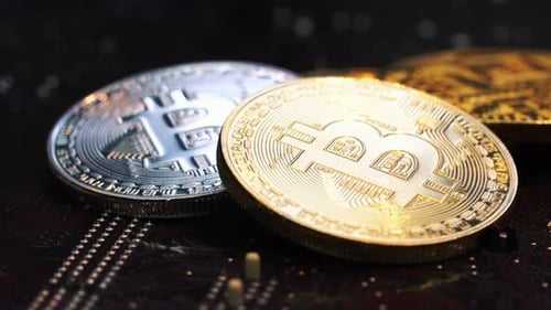 Close Up of Shiny Silver and Gold Bitcoin