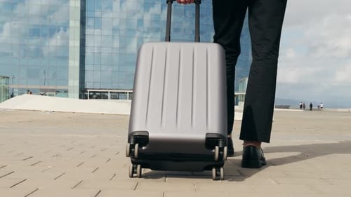 Tourist Man with Suitcase Baggage in Spain A Traveler with Luggage Suit Jacket on Business Street Go