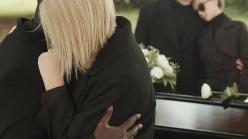People Mourning at Funerals