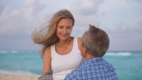 Romantic Middleaged Couple Enjoying a Peaceful Evening Together on the Beach Love Connection and