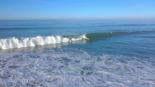 Surfers Riding Waves in California Aerial Drone View Active