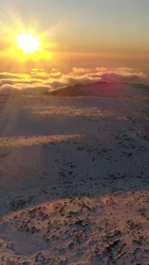 Snow mountain landscape at Sunset Vertical Video