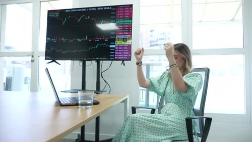 Enthusiastic Woman Celebrates Positive Stock Market Results