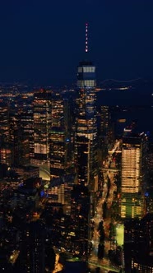 Multiple city lights of glamorous New York at night.