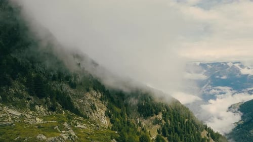 High Mountain View With Dense Fog In Alps Drone Flying