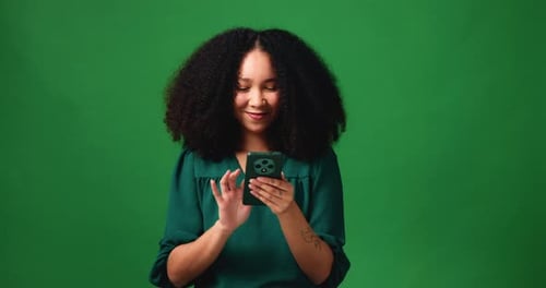 Phone, laughing and social media with woman on studio space for comedy, humor or meme reaction