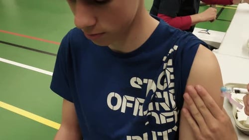 Meningococcal Vaccinationin The Netherlands. a Young boy gets his vaccin against the Neisseria menin
