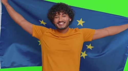 Man Holding European Union Flag on Green Screen