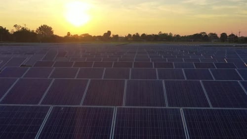 Aerial view of solar panels stand in a row landscape electrical power