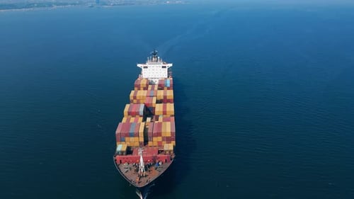 Aerial View of Container Ship Sailing in Ocean
