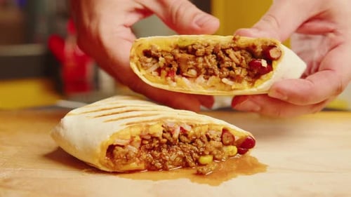 Close Up of Chef Cooking Burrito Eating Traditional Mexican Food Tex Mex Cuisine