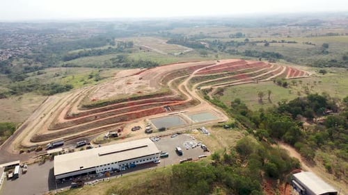 Aerial top view of a city garbage dump. Waste Disposal Facility