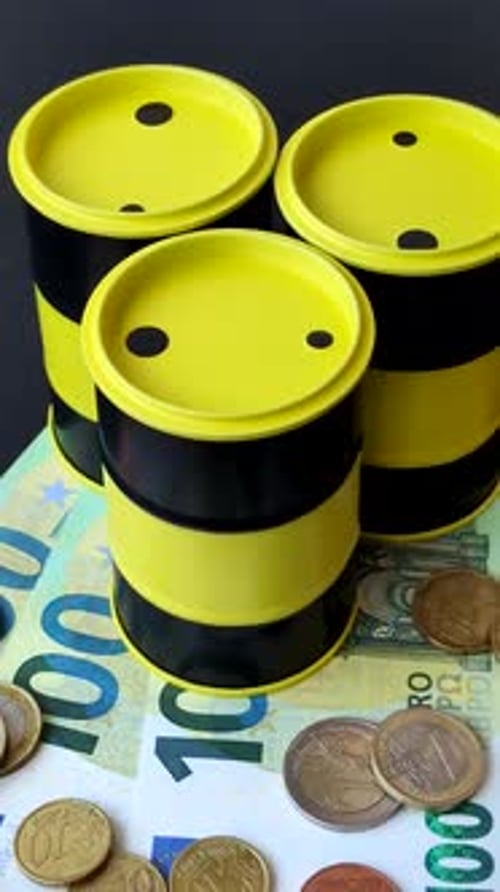 A barrel of oil against a backdrop of euro as a concept for the oil crisis. A barrel of oil