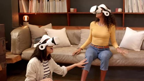 Women Experience Virtual Reality Headsets Together