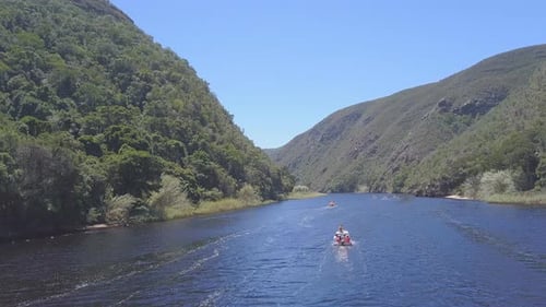 Aerial of boating on lake in South Africa for summer leisure fun and activity