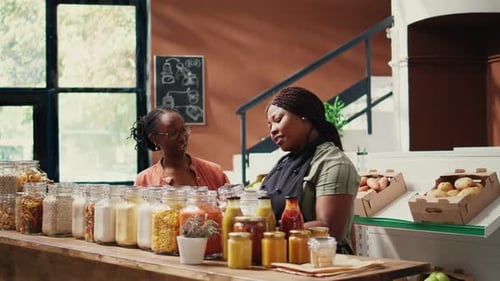 Two Adults Chatting in a Grocery Store