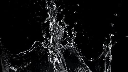 Water splash isolated on black background in slow motion