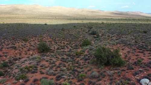 Aerial shot of Red Rock Canyon National Conservation Area. Showcasing the arid desert terrain with b