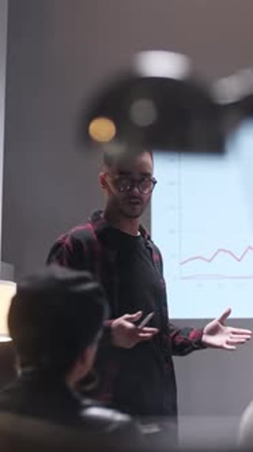Business Meeting Office Team Analyzes Business Growth Young Man Interested In Audience On Screen