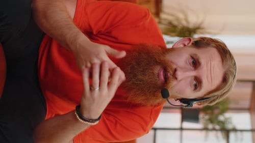 Bearded Man Freelance Worker Call Center Support Service Operator Helpline Having Talk with Client