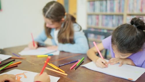 Group of young boy and girls enjoy to learn or study in drawing classroom also some paint in school