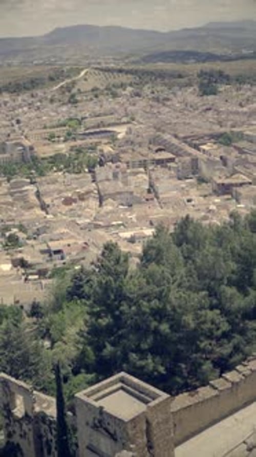Vertical video of Alcala La Real, Spain. City from above.