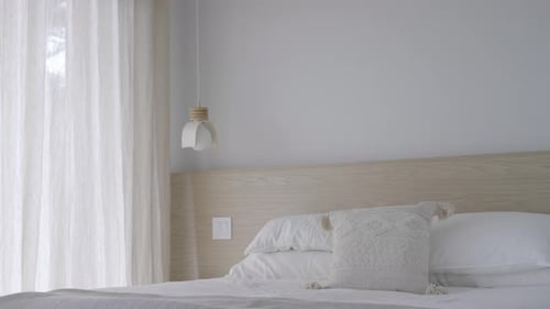 Man With Book Sit On The Bed To Read. - wide