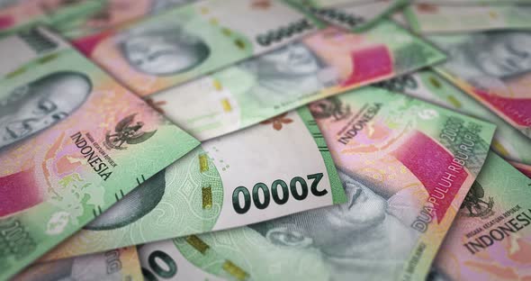 Indonesia Rupiah 20000 banknote flying over money surface, Backgrounds ...