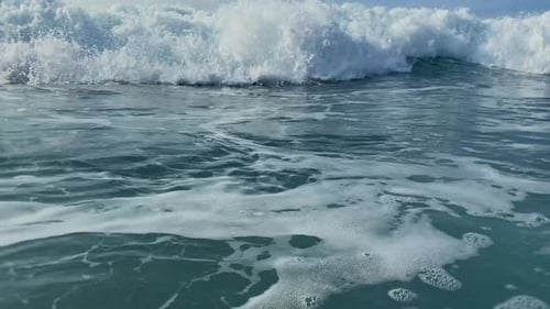 Ocean Wave Breaks on the Camera