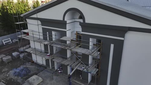 Scaffolds Near Repaired Facade of Culture Palace on Square