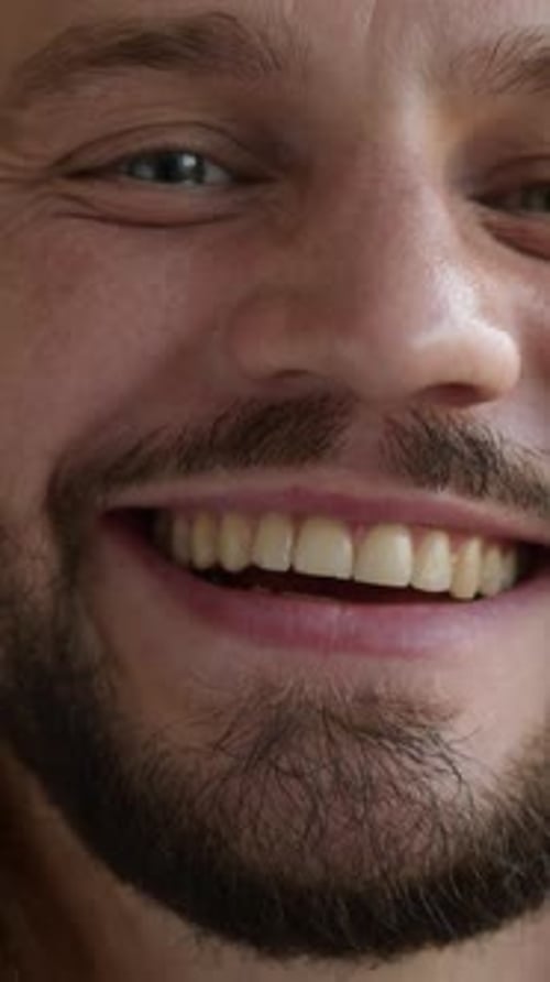 Close-Up Portrait of a Smiling Man