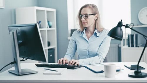 Businesswoman Working in Office