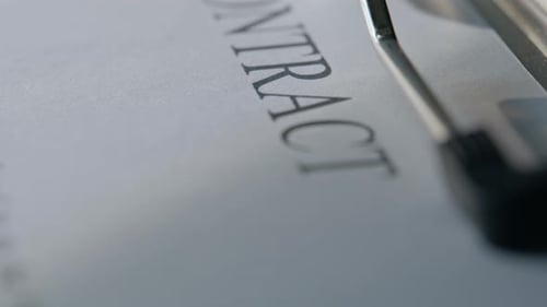 Macro Shot Paper Agreement Sheet Placed on Tidy Workstation Formal Contract