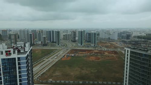 Construction site of a new city block. Construction of multi-storey buildings.