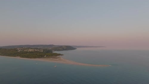 Aerial Orbiting Shot of Sandy Possidi Cape in Halkidiki Greece