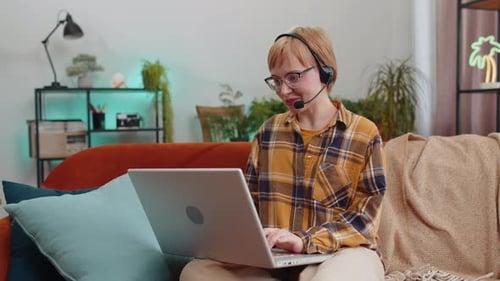 Young Woman Freelance Worker Call Center Support Service Operator Helpline Having Talk with Client