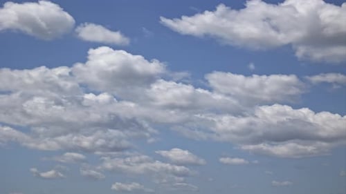 Clouds in a Blue Sky on a Sunny Day Time Lapse
