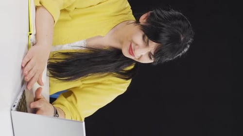 Woman Working at a Computer