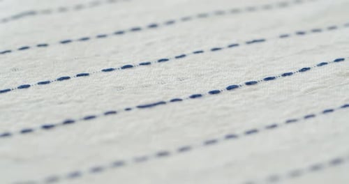 Elegant Cotton Fabric with Light Blue Dashed Pinstripes