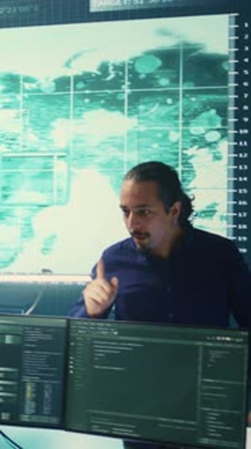 Vertical Video Cyber Defense Team Working in a Governmental Security Operations Center