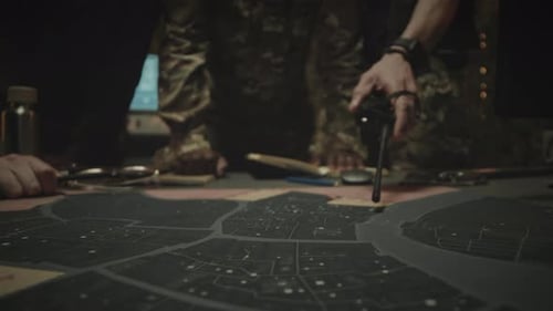 People Plan With Black and White Map