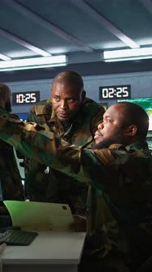 Men in Uniform Working Together in Office Space