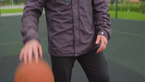 Casual Street Basketball Rookie Guard Practicing Shots Amidst City Surroundings Young Basketball