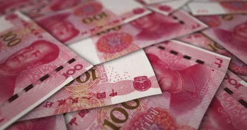 China Yuan 100 banknote flying over money surface