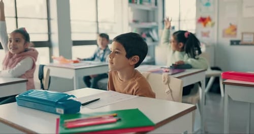 School, education and children with question in classroom for lesson, learning