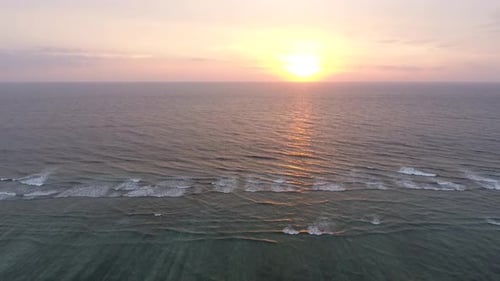 Ocean Waves at Sunset Aerial View