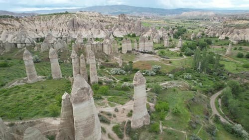 Aerial View of Cone-Shaped Rock Formations on Hills